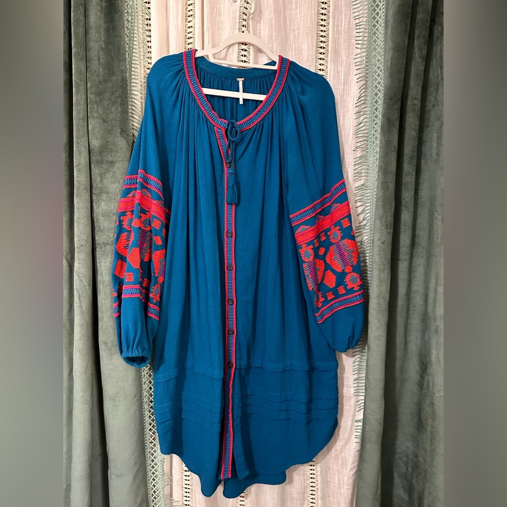 Free people in the clear embroidered dress. Size XS. EUC